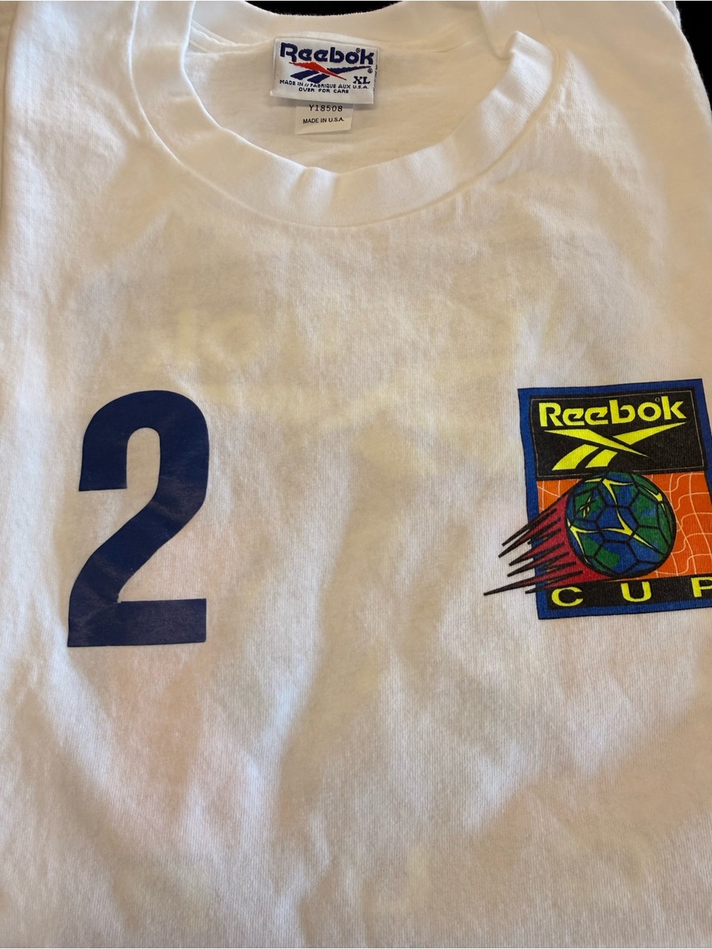 Reebok white vintage soccer cup T-shirt.